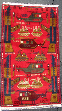 Red rug with numbered tanks/helicopters and 5 square pattern Afghan Rug